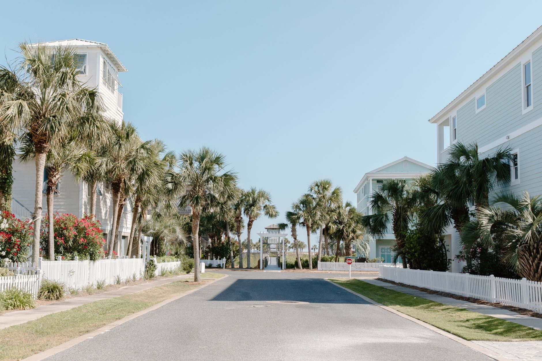 Street-legal golf carts cruising a sunny Florida neighborhood road